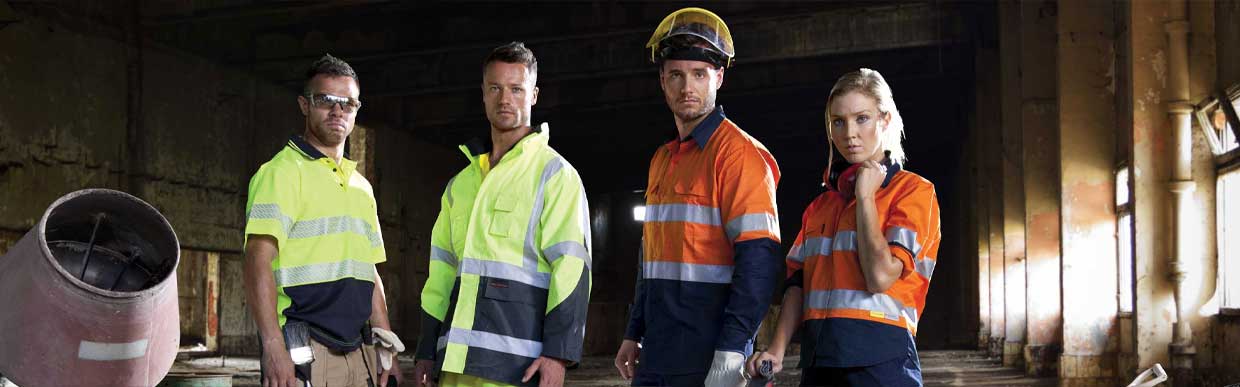 Professional industrial safety team collaborating on workplace safety solutions