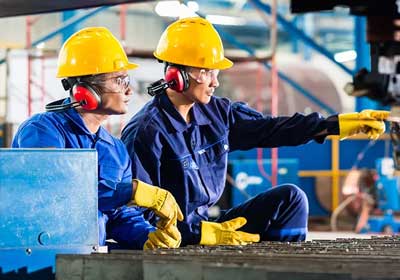 Safety professional using M Industrial Safety website for workplace safety solutions
